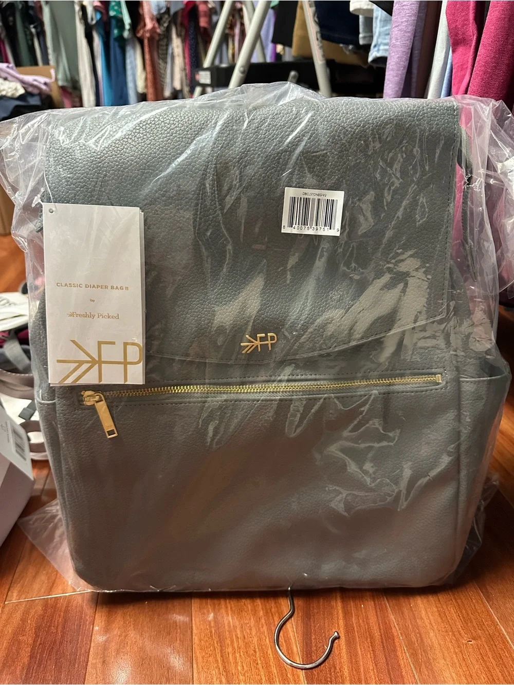 Freshly Picked gray pebble leather backpack with gold hardware